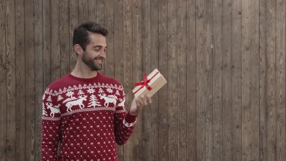 Christmas Guy Getting A Gift