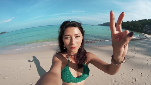 Pretty Young Woman Making Selfie on Tropical Beach