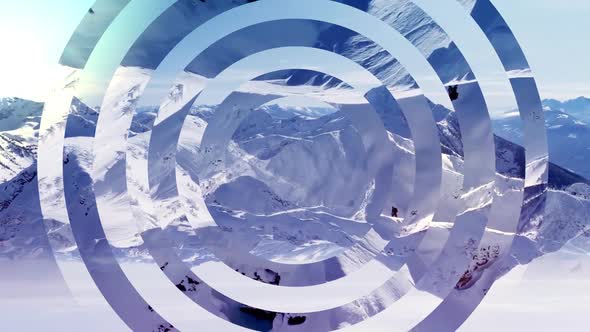 Mirror glass circles on snowy mountains background alt