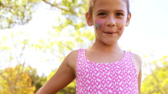 Cute girl smiling in park