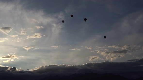 Balloons Fly Across the Sky