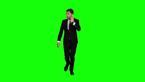 Guy Rushes To Him the Phone Rings, He Starts Talking and Running. Green Screen