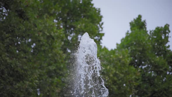 Stream of fountain water splashes