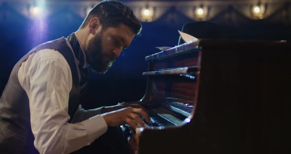 Man Playing Piano on the Stage