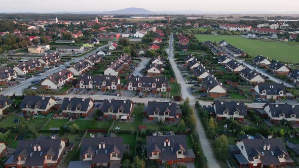 Aerial View of Small European City with Modern Residential Suburb Neighborhood