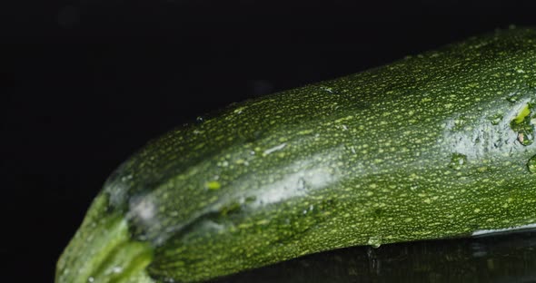 Ripe Zucchini Is Rolling in the Water. 