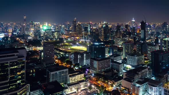 Bangkok business shopping district city center, during night, zoom in – Time Lapse