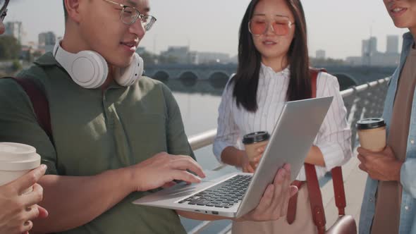 Asian Colleagues Coworking Outdoors