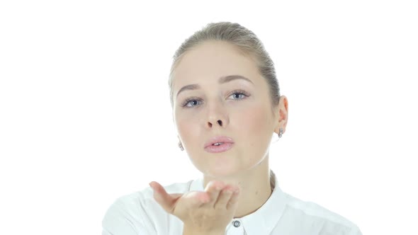 Flying Kiss by Young Beautiful Woman, White Background