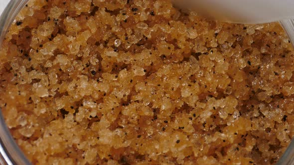 Beauty Salt Scrub Texture Closeup Beautician Taking Natural Product with Spatula