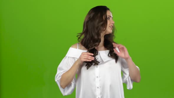 TV Presenter Tells Everyone About the Weather, She Is Smart and Beautiful. Green Screen
