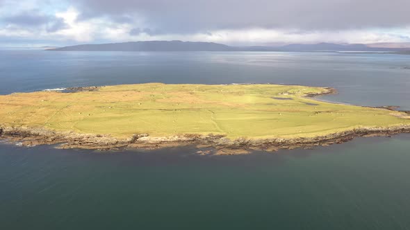 Aerial View of an Rainbow Above the Atlantic Ocean and Inishkeel By Portnoo in Donegal  Ireland