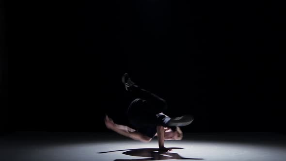 Young Blonde Dancer Man Continue Dancing Breakdance on Black