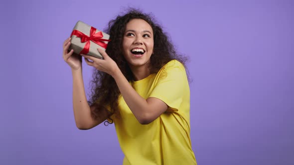 Excited Woman Received Gift Box with Bow