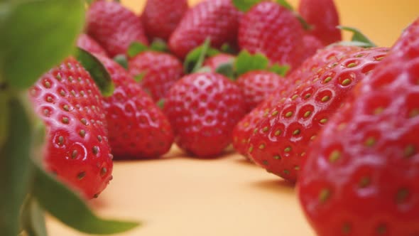 Pile of fresh strawberries on table