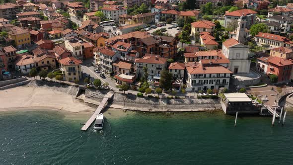Establishing Aerial Drone Shot of lake Lago Maggiore on a Sunny Day