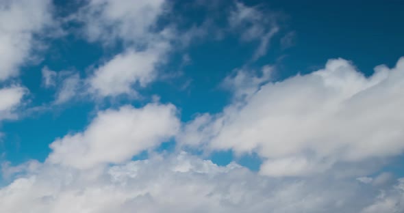 Timelapse of the Blue Sky Moving Clouds Background