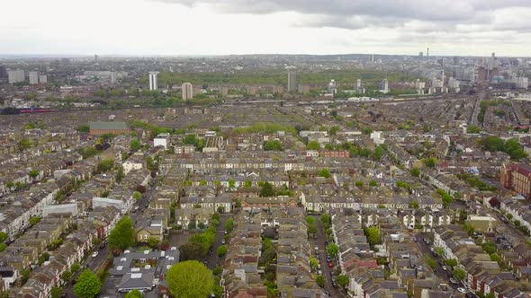 Hovering above an English residential housing estate with streets of row houses