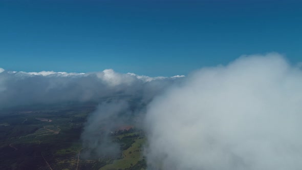 Above the clouds. Sunrise foggy morning.