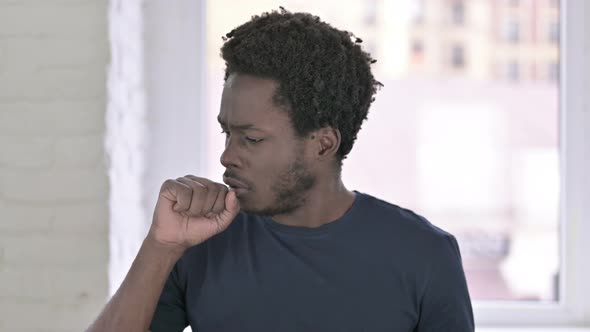 Portrait of Sick Young African American Man Coughing