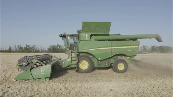 Combine Harvesting Wheat Top View of a Wheatfield