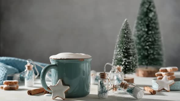 Cup of hot chocolate and gingerbread stars cookies