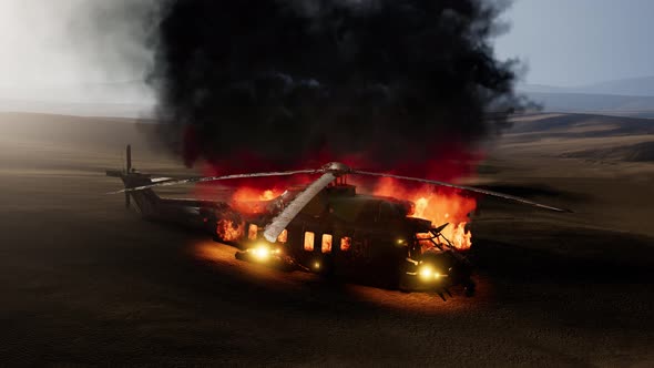 Burned Military Helicopter in the Desert at Sunset