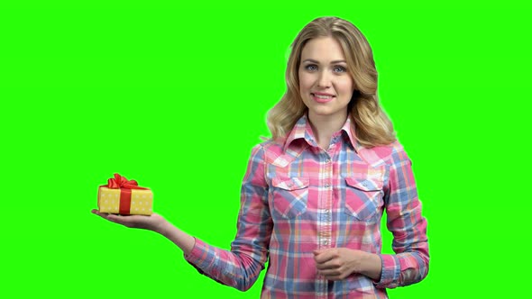 Pretty Girl with Gift Box on Green Screen