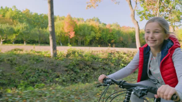 Girl Riding a Bike