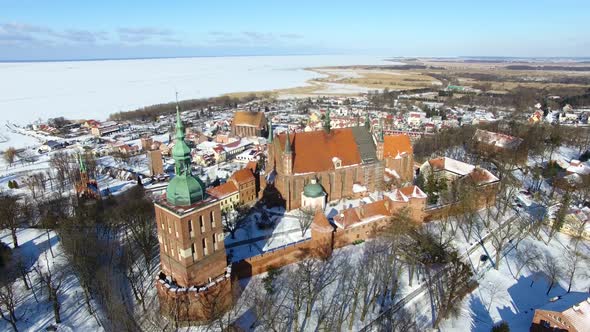 Aerial: Castle of Frombork in Poland, wintertime