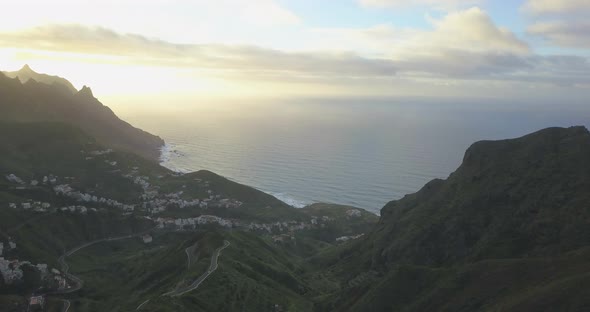 Aerial drone view of the coast coastline ocean sea at sunset in Tenerife, Spain.