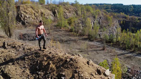 Sportsman workout outdoor. Aerial view of young sportsman on nature