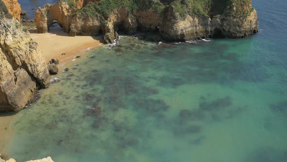 Tilt up of a rocky sea shore