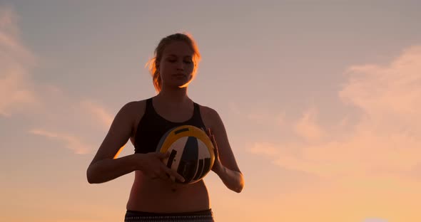 Young Girl Jump Serve Volleyball on the Beach, Slow Motion.