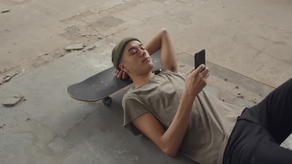 Fashionable young man in an abandoned warehouse