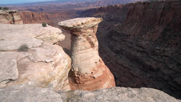 Panning view revealing rock spire in Long Canyon