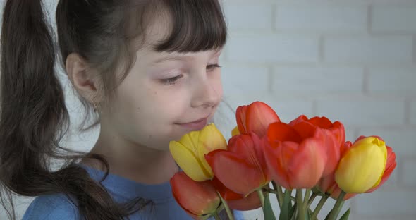Happy Child with Tulips