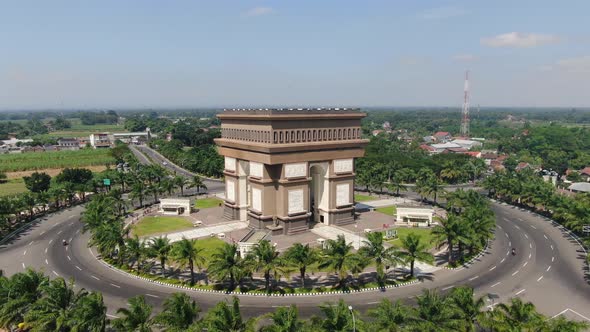 Simpang Lima Gumul Monument landmark of Kediri, Java, Indonesia. Aerial orbiting