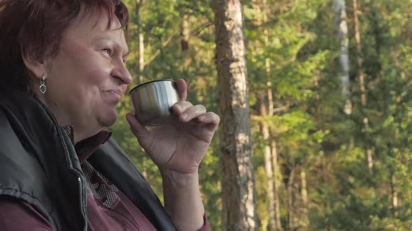 The Middle Aged Lady Happily Sipping Her Tea in Espoo Finland