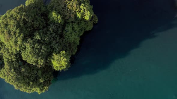 AERIAL: Lago De Camecuaro, Boat, Swimmer, Tangancicuaro, Mexico (Ascending Down)