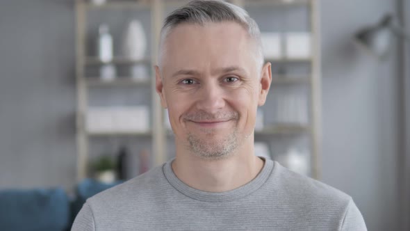 Yes, Positive Gray Hair Man Accepting Offer By Shaking Head