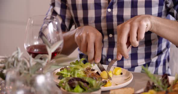 Woman Hands Drinking Wine and Eating Detail