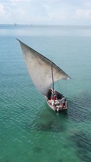 Vertical Video Boats in the Ocean Near the Coast of Zanzibar Tanzania