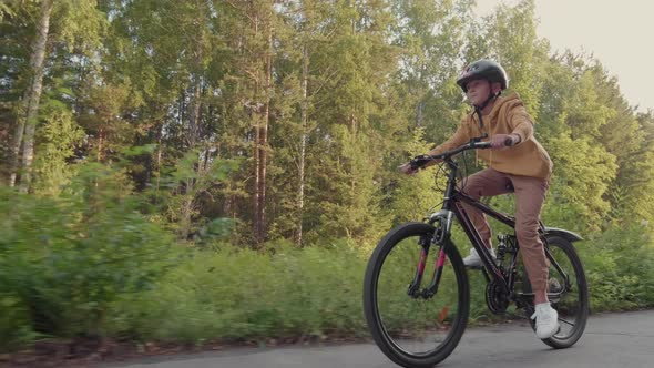 Boy Cycling Outdoors