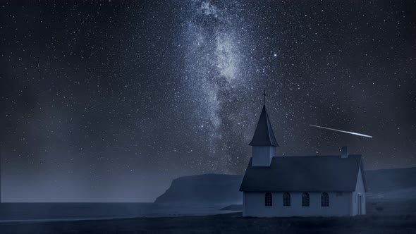 Church on the beach at night with stars, Iceland, timelapse