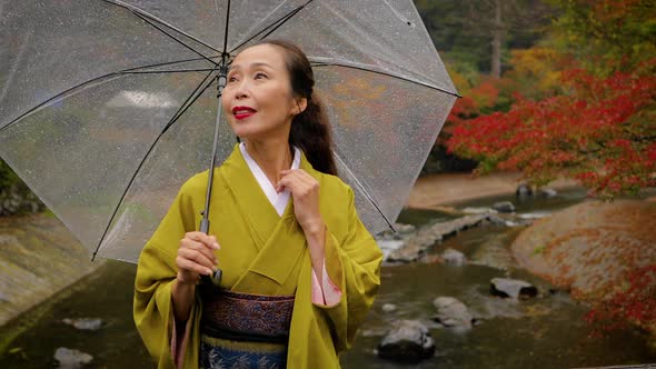 Japanese woman walking in the forest in Kyoto Japan