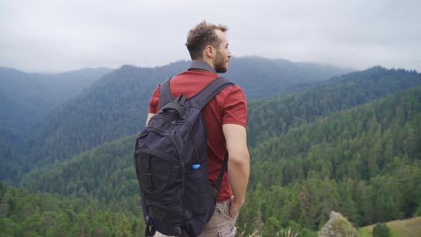 The man who takes a deep breath at the summit.