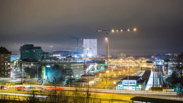 Time Lapse of Railroad Tracks and Construction Site at Night