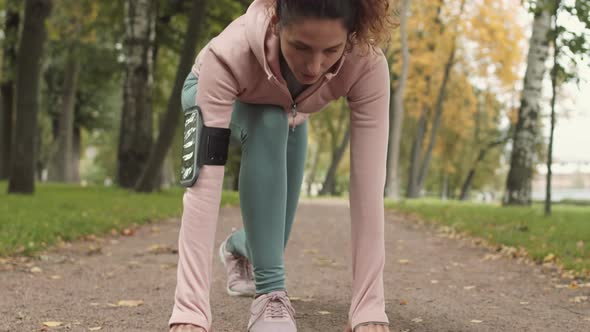 Sporty Woman Having Training in Forest