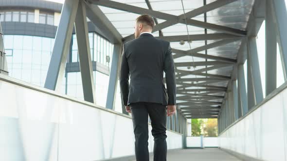 Confident Guy in Suit Being on His Way to Work